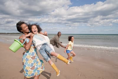 Family Playing on The Beach