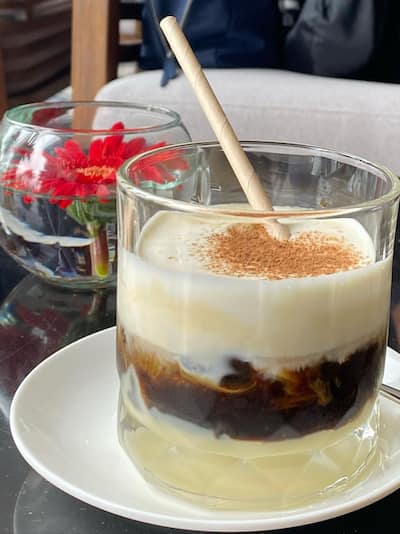 a drink with a straw on a table