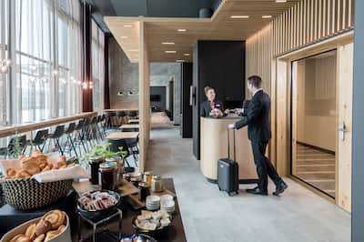 Executive Lounge with guest arriving