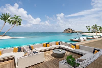 Outdoor main swimming pool and sun loungers