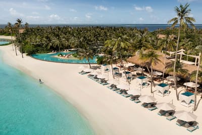 Overhead view of beack with deck chairs
