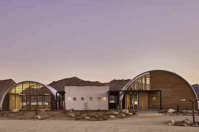 Clubhouse exterior with dusty road