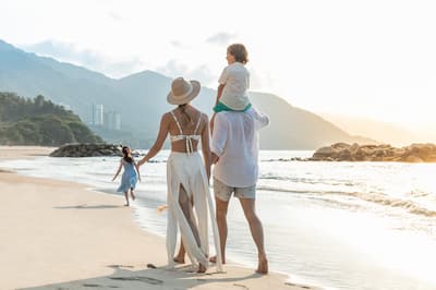 Family walking on the beach