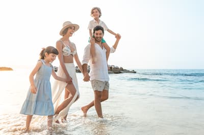 Family walking on the beach
