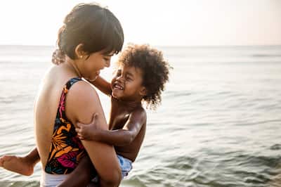 Mother and son on the beach