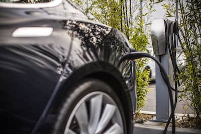 Black car at an Electric Car Charging Station