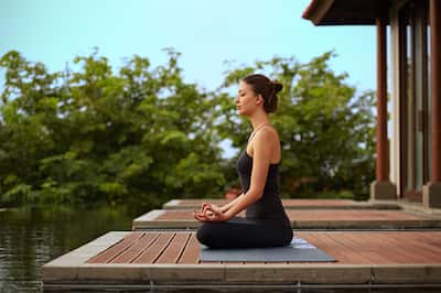 Woman Performing Meditation